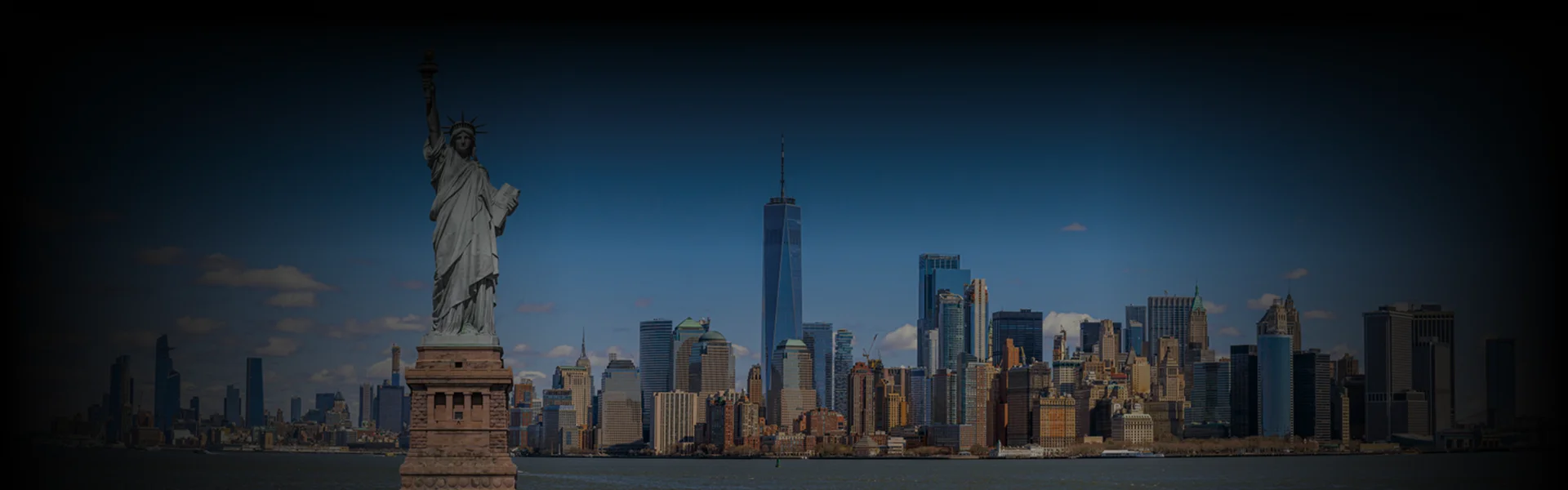 Statue of Liberty and New York skyline with Freedom Tower on Prestige Ride's NYC State page